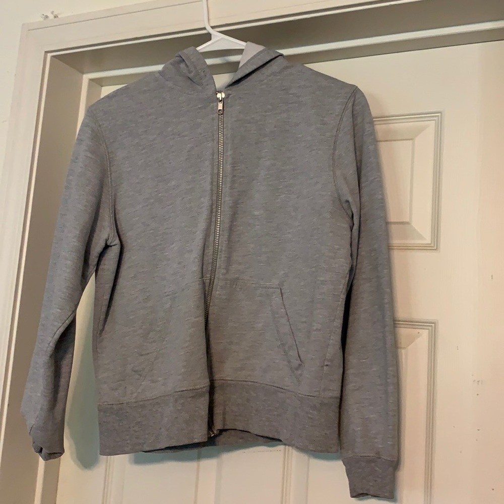 A Cotton Couture grey zip-up hoodie. Size small.
